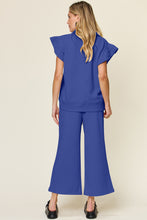 Load image into Gallery viewer, Double Take Texture Ruffle Short Sleeve Top and Drawstring Wide Leg Pants Set
